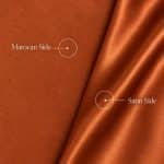 Copper orange Moroccan sablé fabric showing its matte textured face on the left and glossy satin reverse in folds on the right, with white callouts labelled “Marocan Side” and “Satin Side”.