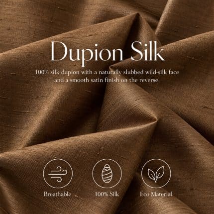 Copper-brown Dupion silk in soft folds, with overlaid text reading “Dupion Silk”, a description of its slubbed texture and three icons describing its fibre and finish.