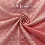 Soft pink silk jacquard gathered into a spiral, with overlaid text reading “Silk Jacquard”, a description of the 100% silk fabric, and icons labelled “100% Silk”, “Jacquard” and “Lightweight”.