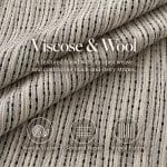 Off-white and midnight blue textured fabric folded in layers, with overlaid text reading “Viscose & Wool” and a description of its open striped weave. Three icons are labelled “Wool & Viscose”, “Textured Weave” and “Striped Pattern”.