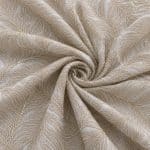 Ivory chiffon embroidered with sweeping feather-like motifs and tonal micro sequins, gathered into a central spiral of folds.